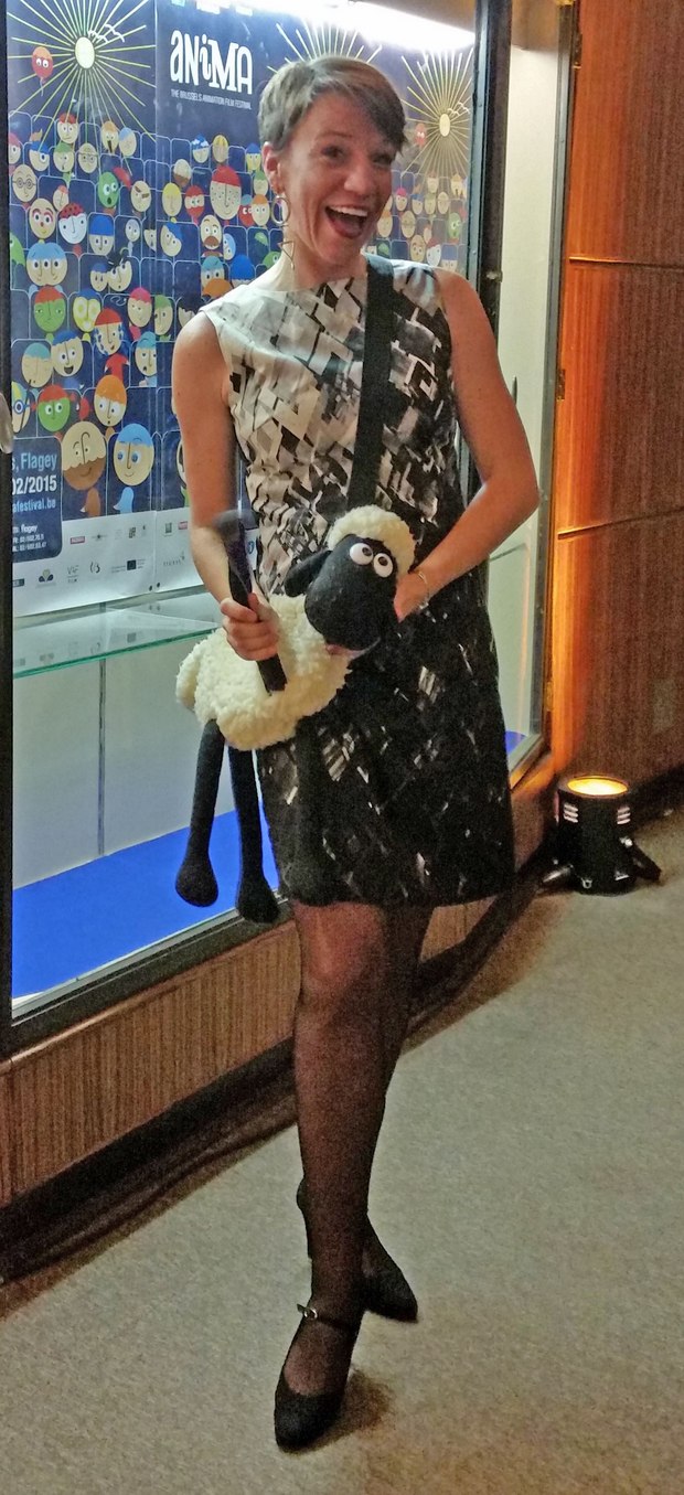 Festival presenter Stephanie Coerten proudly displaying her Shaun the Sheep purse