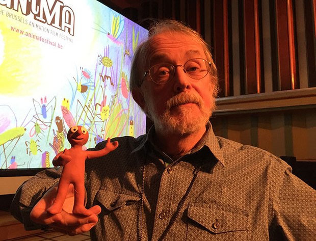 Peter Lord listens while Morph explains