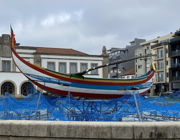 Traditional Portuguese fishing boat no longer in the water but in front of city hall