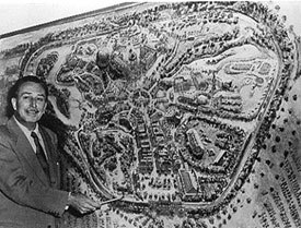 Does he look like an evil emperor to you? Here Uncle Walt shows off the master plan for Disneyland. © Disneyland.