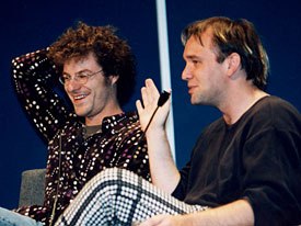 Matt Stone and Trey Parker speaking at NATPE 1999. Their early morning discussion covered their production process, thoughts about the show and examples of their early work. Photo courtesy of NATPE.