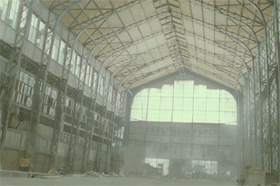 For this major action set piece, Carsoux matched actual framing on set with the previs image, which he them combined with a CG blimp. This allowed Jeunet to see the final composition before commiting the shot to film.