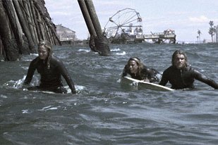 Z-Boys Stacy, Tony and Jay surf off Venice's burnt out Pacific Ocean Pier in the films opening. The pier, Ferris wheel and beachfront buildings were created by Gray Matter FX.