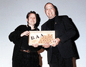 Richard Golszowski receiving one of his trio of awards for the very popular Robbie the Reindeer: Hooves of Fire. Photo courtesy of BAA.