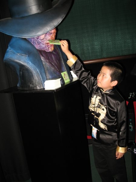 Perry Chen feeding cards to monster at NMFF premiere. (photo by Zhu Shen)