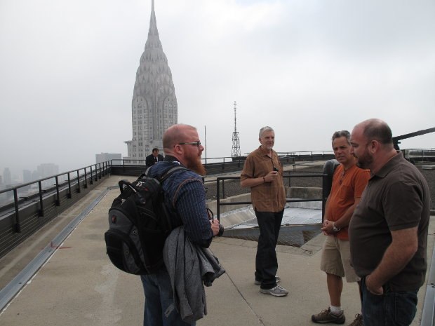 VFX Supervisor Jay Redd (left) along with Ken (middle), location manager Robert Striem (middle right) and key grip Mitchell Andrew Lillian (far right) on a New York City building rooftop during the making of Men in Black 3. Image courtesy of SPI.