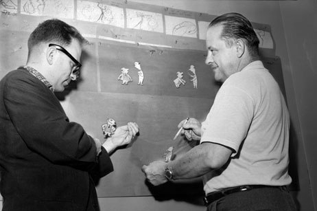 Gene Deitch and Connie Rasinski examining production cels for the Bert & Harry Piels Beer commercials at Terrytoons, 1957. Photo from J.J. Sedlmaier Productions' collection.