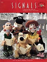 The Holiday 1997 cover of the Signals catalog, which offers specialty and imported Wallace & Gromit merchandise to the U.S. market via mail-order.