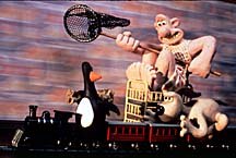 In The Wrong Trousers' train chase scene, animators moved the wall in the background to create a realistic motion blur. © Aardman.