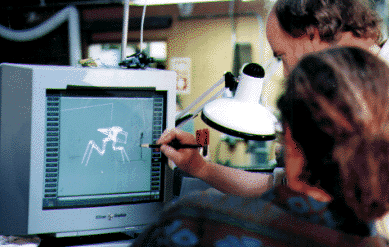 Animator/director Phil Tippett works directly on the Silicon Graphics screen to adjust the scale of a computer generated character for TriStar's Starship Troopers.