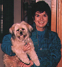 Jane Baer, Principal of Baer Animation Company and her dog Millie.