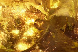 Huge miniatures were used to create the climactic fire at the end of the film. © 2005 Warner Bros. Ent. Inc.  U.S., Canada, Bahamas and Bermuda; © 2005 Village Roadshow Films (BVI) Ltd.  All other territories. Photo credit: Clau