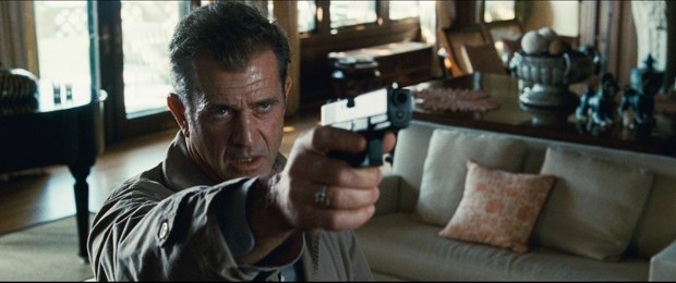 Mel Gibson is back but with more restraint and vulnerability. This shot leads to some gory CG maneuvering with a bullet. All images courtesy of Warner Bros. Pictures.