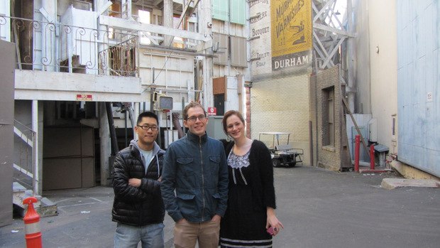 Minkyu, Tim and Fondhla in front of one of the countless generic building fronts used in countless shows and commercials.