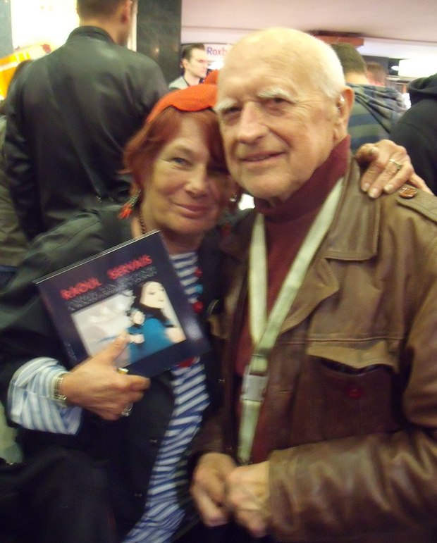 Renowned Belgian animator Raoul Servais presenting a copy of his biography to Nancy