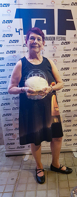 Nancy showing off her glass TAF award