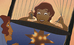 Joseph gets a better look at the special coat his mother, Rachel, weaves for him. TM and © 2000 Dreamworks LLC.