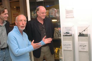 Festival directors Sebastian Popp and Tom Atkin look on as Tippett receives a place of honor on the Wall of Fame, a permanent installation in Frankfurts German Film Museum. This is the first time an animator has been honored at this site.