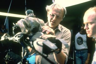 Muren (left) adjusts the camera on the set of Return of the Jedi. Even though Muren worked on almost all the Star Wars episodes, he doesn't see the two trilogies as being related.