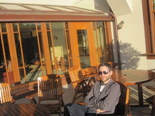 Patrick Doyon suns himself on the deck at Big Rock Ranch.
