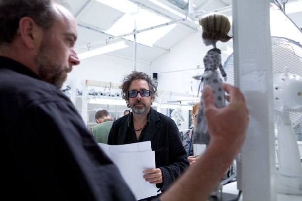 Animation Director Trey Thomas holds up the Mom puppet for Director Tim Burton to review in the Puppet Hospital. Photo by: Leah Gallo.