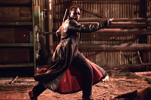 Blade: Trinity vfx supervisor Joe Bauer eschews CG stunts on film and digital doubles. Instead he uses live-action elements and composits them into the original plate, using digital transitions to smooth things out. © 2004 Diyah Pera/New
