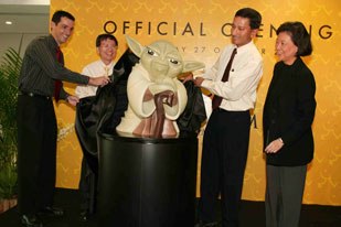 Lucasfilm Animation Singapore opens. Christian Kubsch, gm of the new facility (left), and Micheline Chau (right) of Lucasfims Ltd. greet local dignitaries during the ceremony. All images © Lucasfilm Ltd. & TM. All rights reserved.